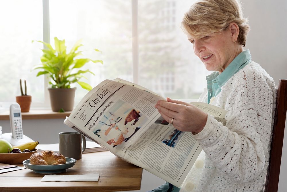 Senior Adult Reading Newspaper Leisure Concept