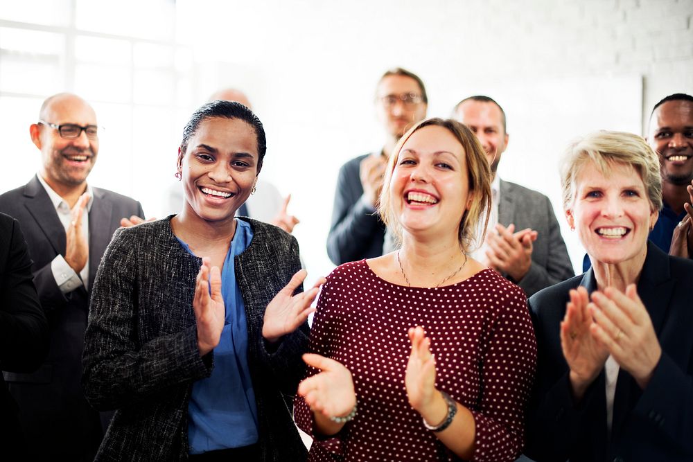 Business People Team Applauding Achievement Concept