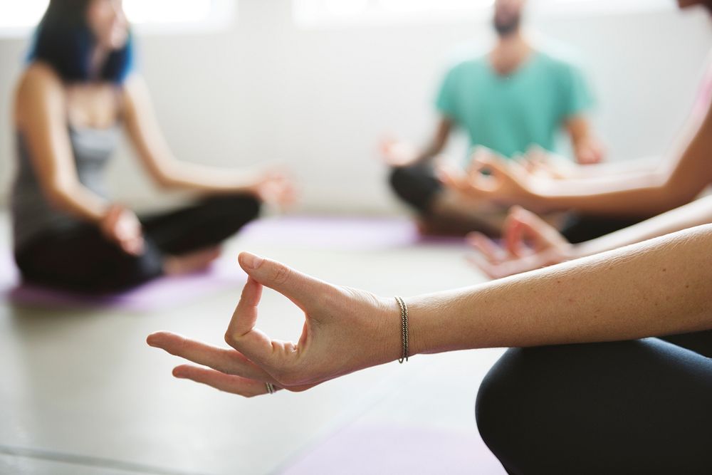 Group of diverse people are joining a yoga class