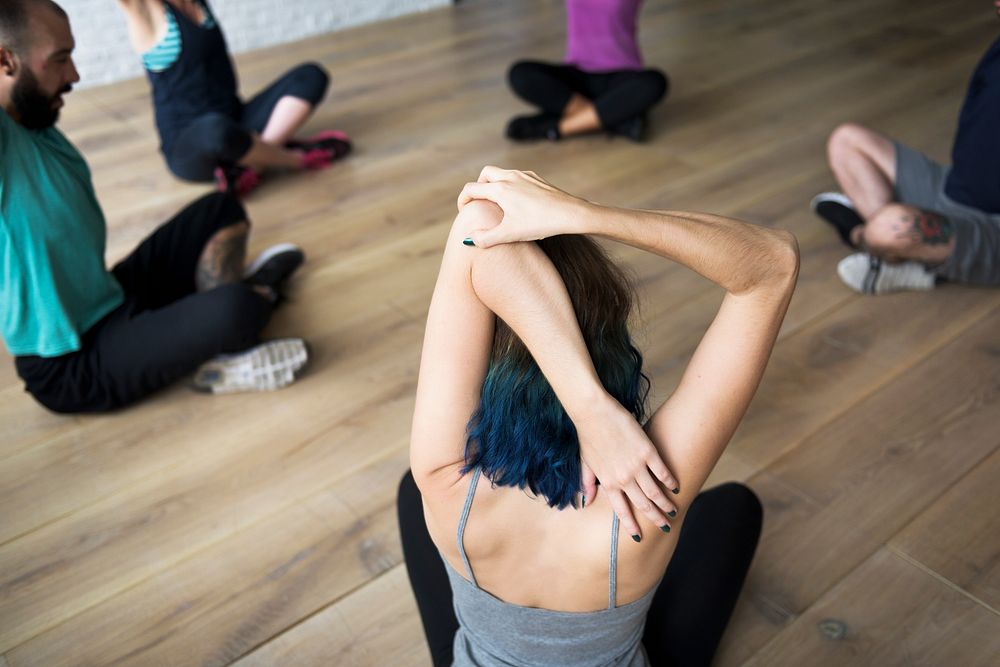 Group of diverse people are joining a yoga class