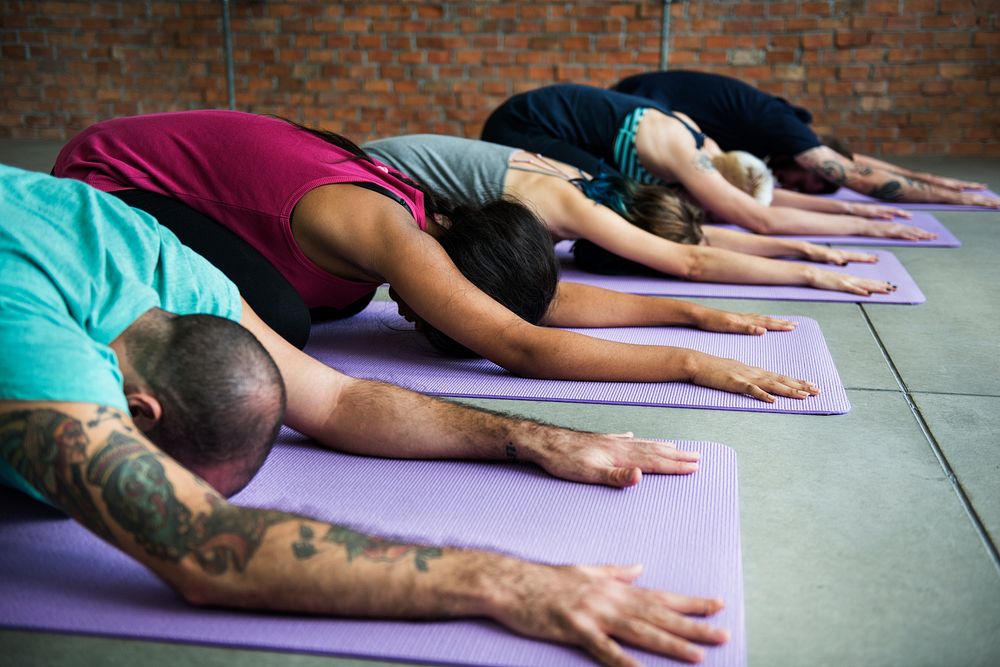 Group of diverse people are joining a yoga class