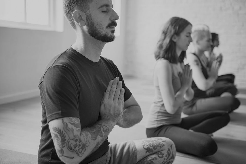 Group of diverse people are joining a yoga class