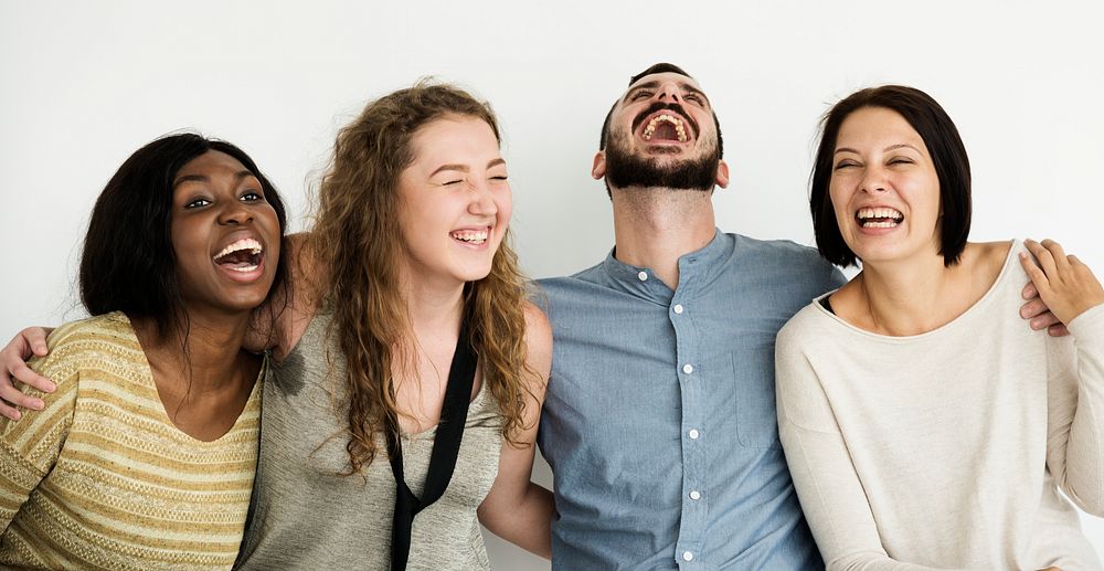 Diverse group of friends laughing out loud