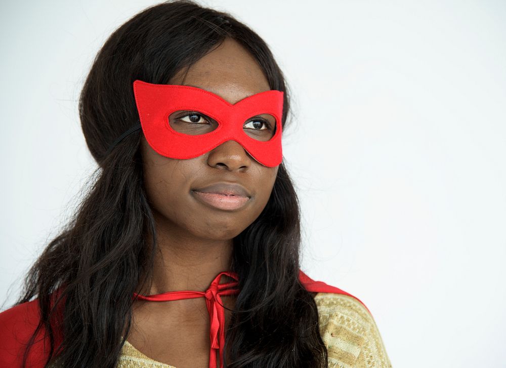 Black girl wearing superhero costume