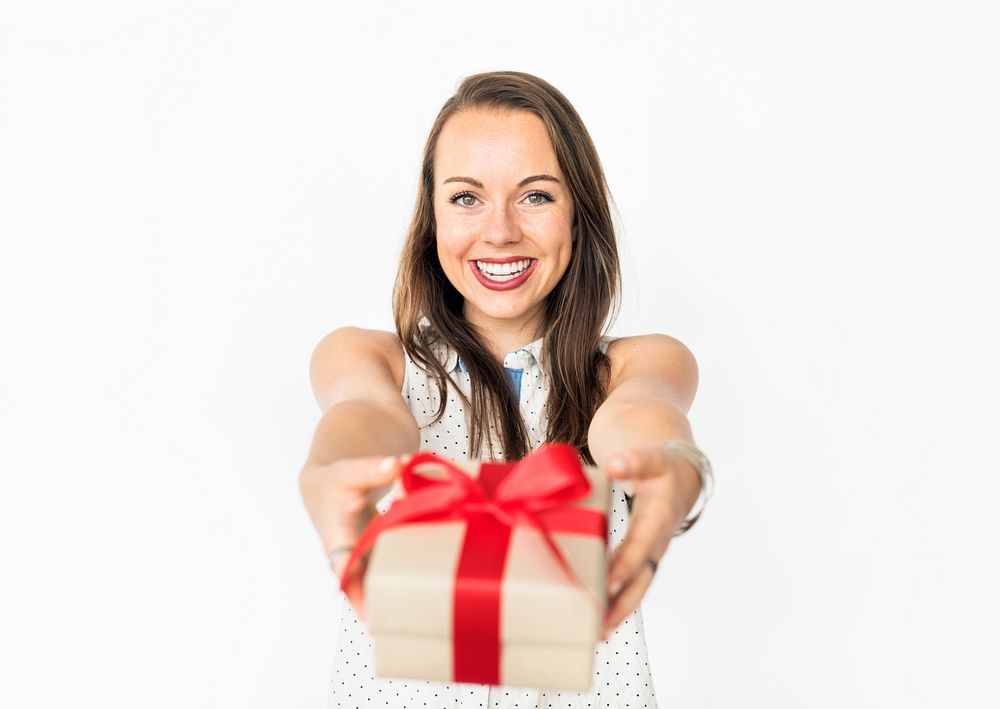 Girl handing out a wrapped present