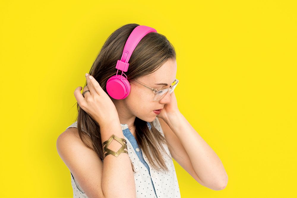 Young Woman Listening Music Concept