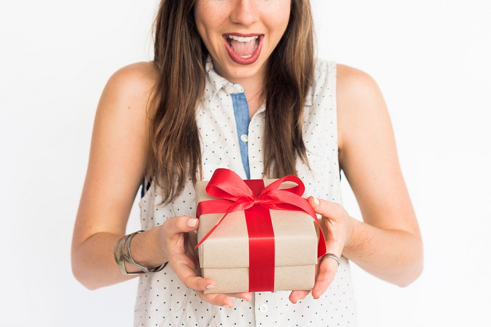 Girl excited about a wrapped present