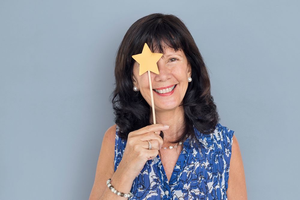 Caucasian Lady Holding Paper Crafted Star