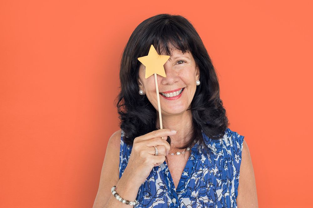 Caucasian Lady Holding Paper Crafted Star