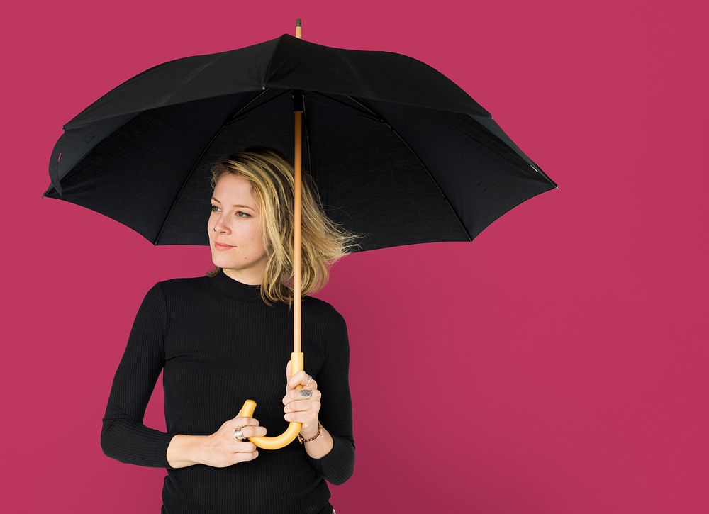 Female Standing Holding Umbrella Concept