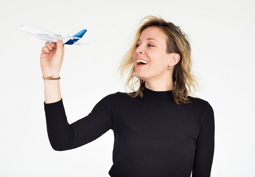Woman Smiling Happiness AIrplane Playful Dream Portrait Concept