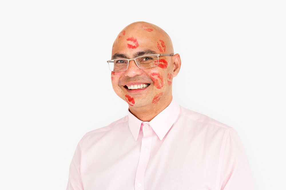 Studio portrait of a man covered in kiss marks