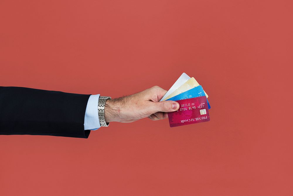 Business Attire Hand Holding Credit Cards