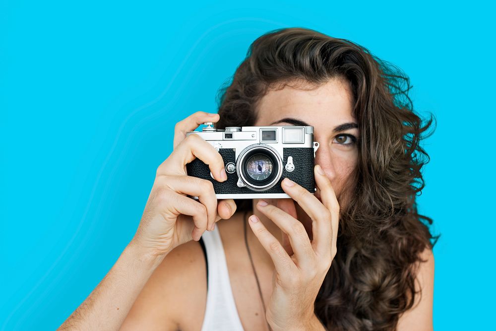 Caucasian Lady Holding Camera Concept