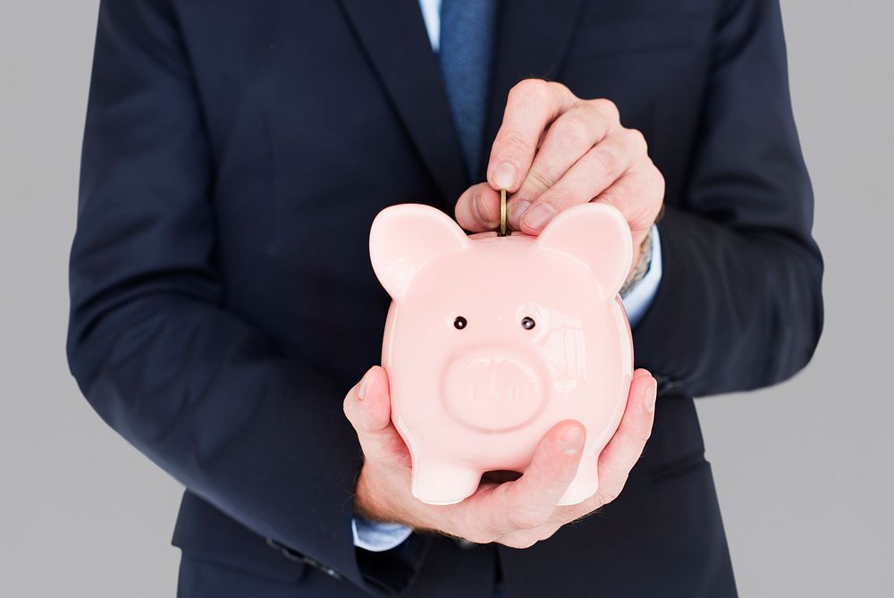 Businessman Holding Piggy Bank Finance Savings