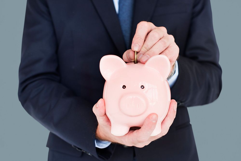 Businessman Holding Piggy Bank Finance Savings
