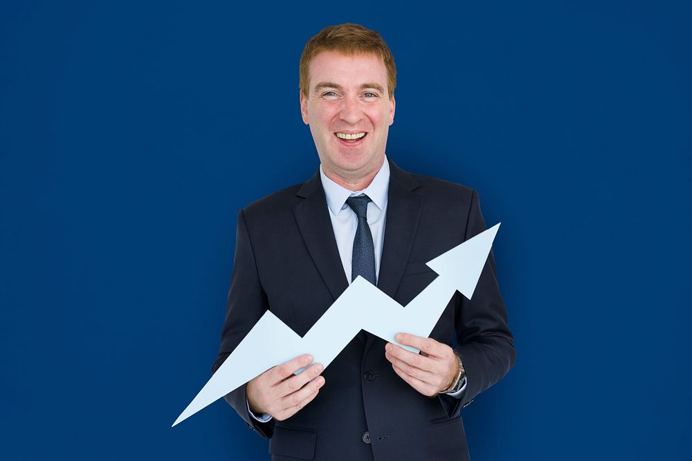 Caucasian Business Man Holding Growth Graph
