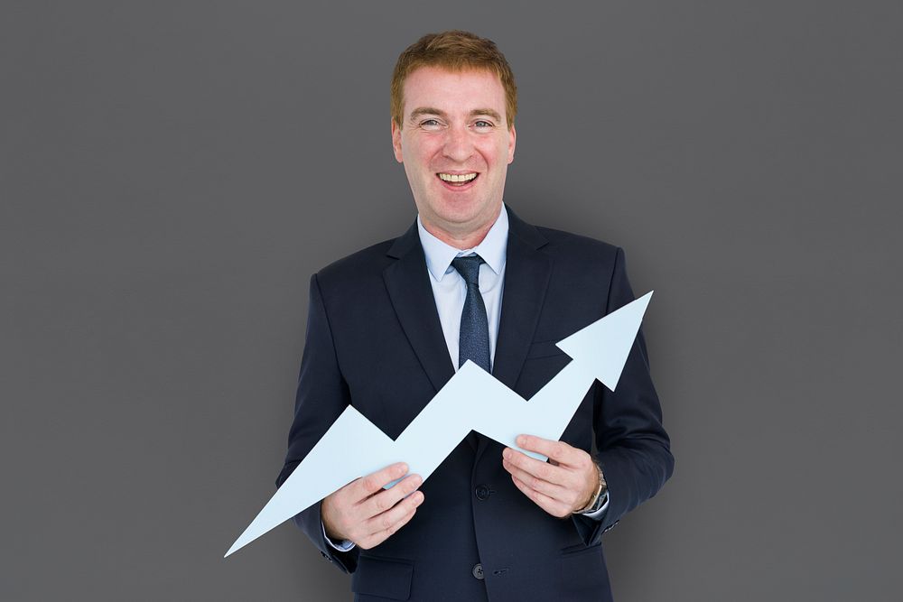 Caucasian Business Man Holding Growth Graph