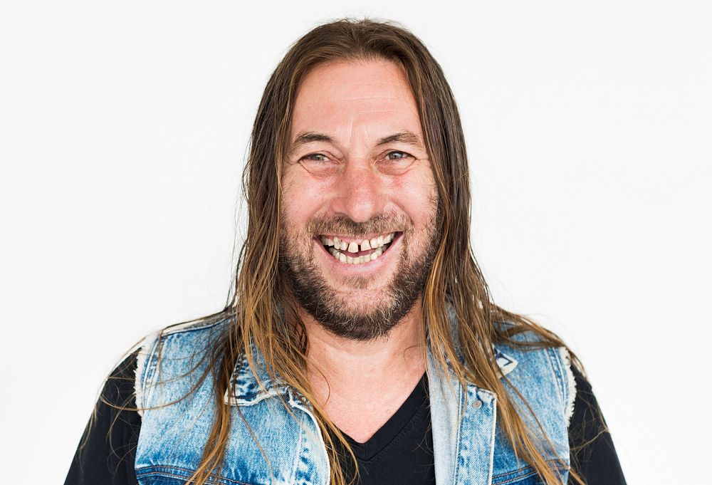 Happy rugged man with long hair and beard