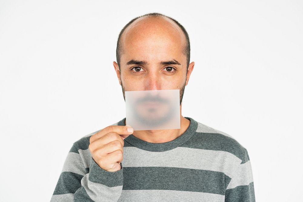 Man Holding Paper Cover Mouth Concept