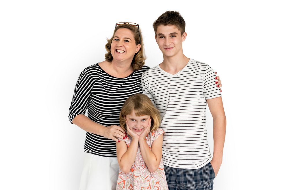 Mother, son and daughter studio family portrait