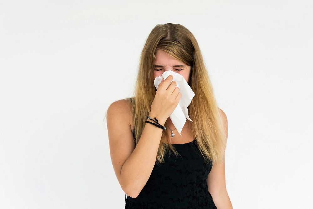 Young Female Sneeze Napkin Concept