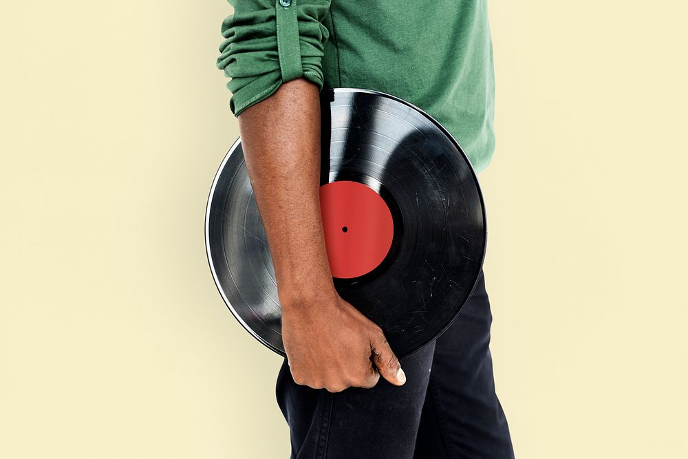 African Man Holding Vinyl Disc Jockey Music Concept