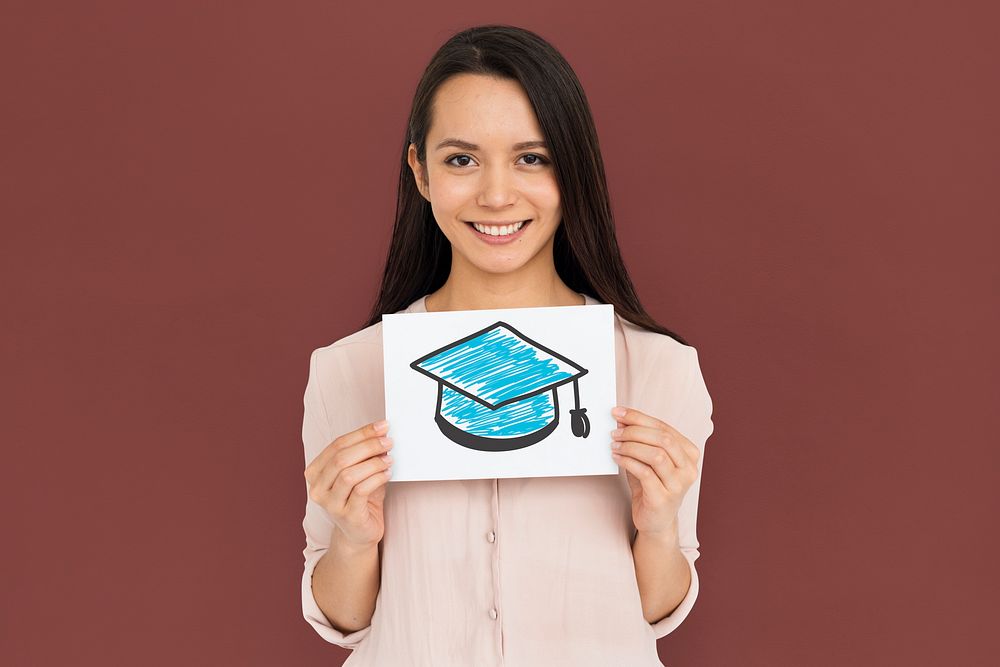 Woman holding placard with mortar board icon