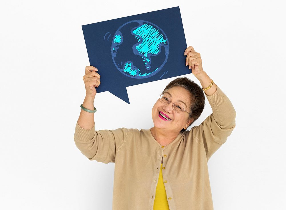 Senior woman holding global communication icon
