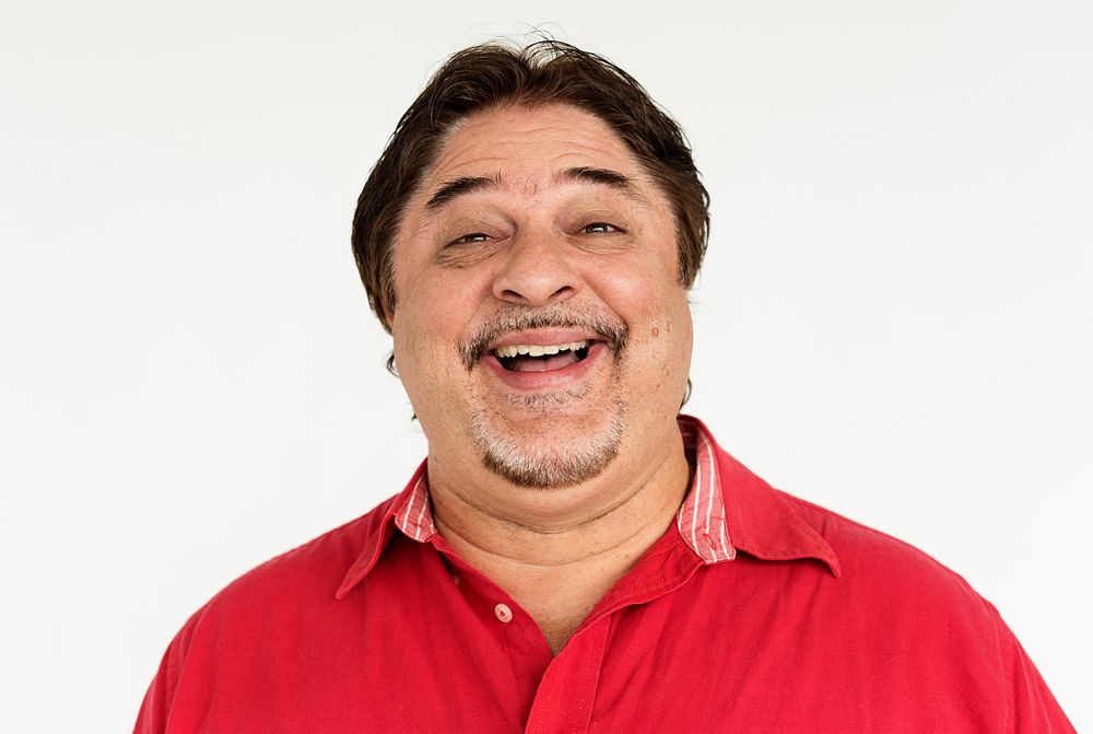 Studio portrait of a man laughing