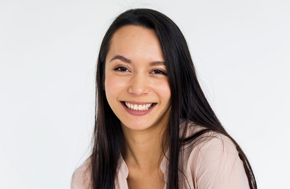 Studio portrait of a young asian woman smiling