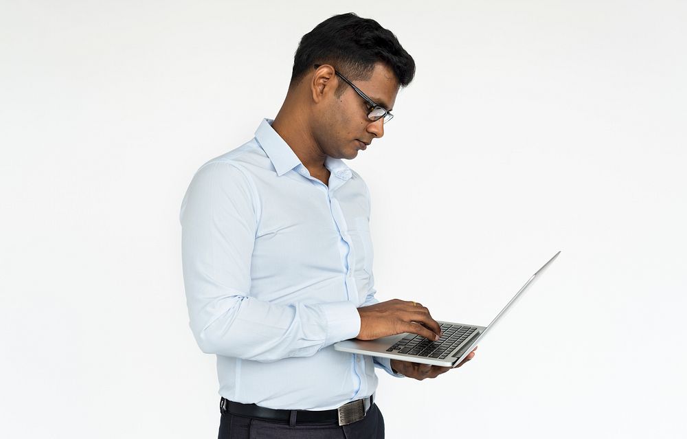 Male Standing Using Laptop Concept
