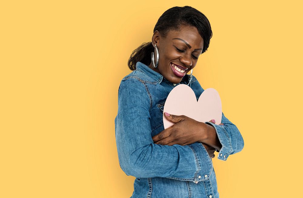 African Woman Holding Heart Love Concept