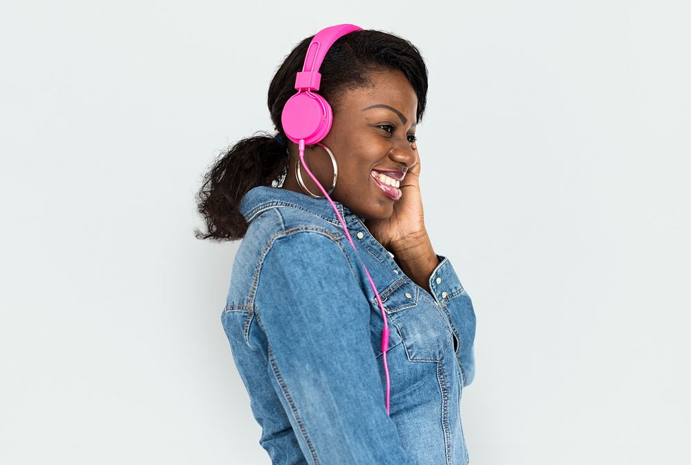 African Female Listening Music Headphone Concept