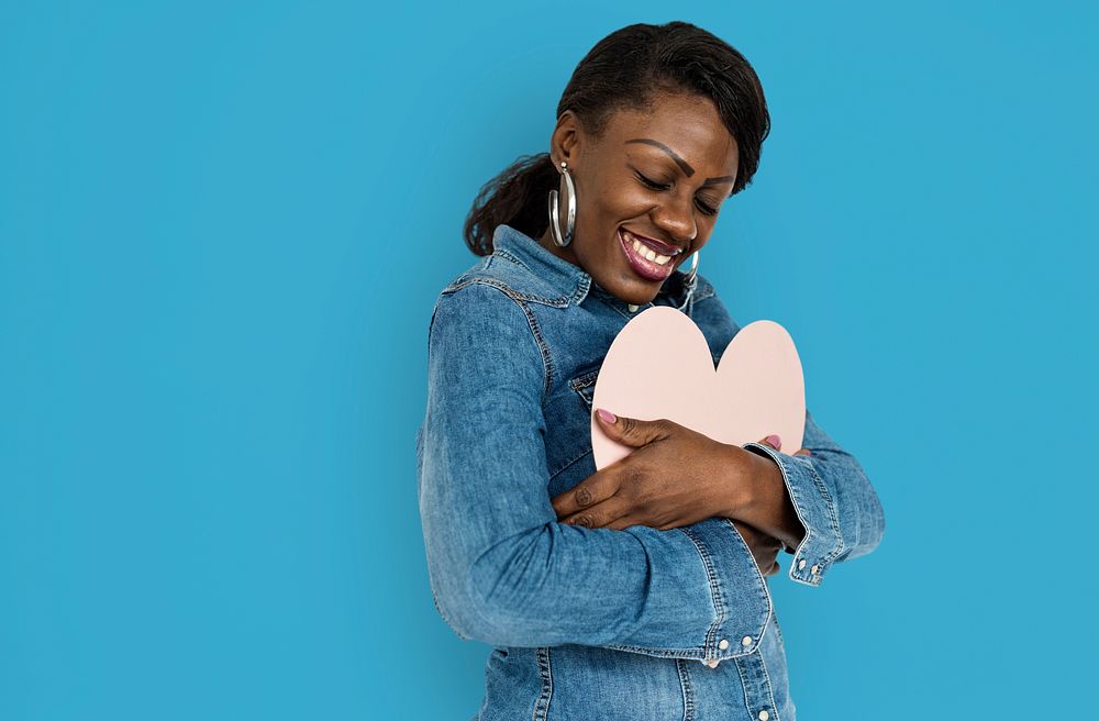 African Woman Holding Heart Love Concept