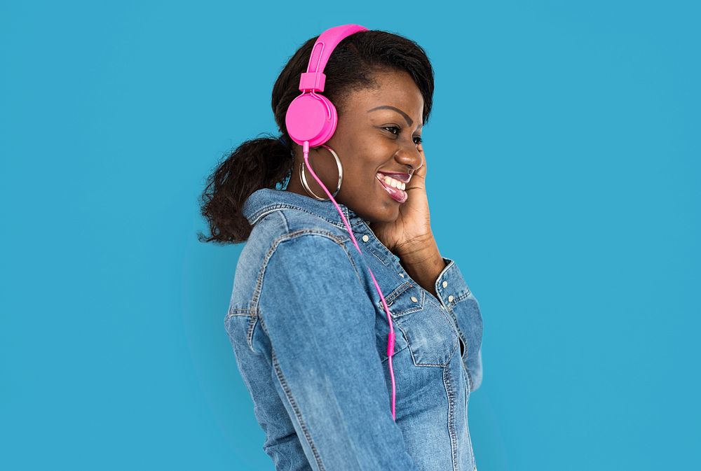 African Female Listening Music Headphone Concept