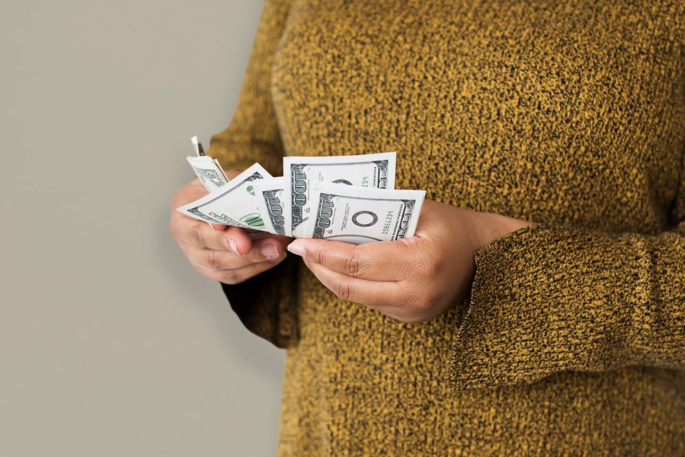 Woman Holding Money Banknote Concept