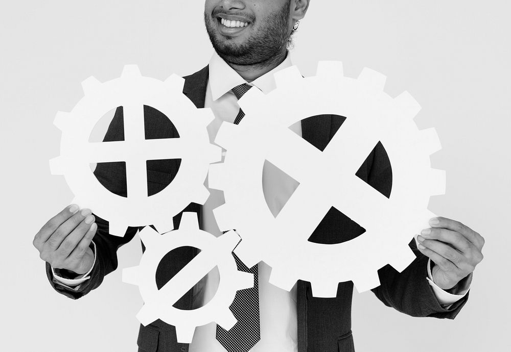 Indian Man with Gears Setting Concept