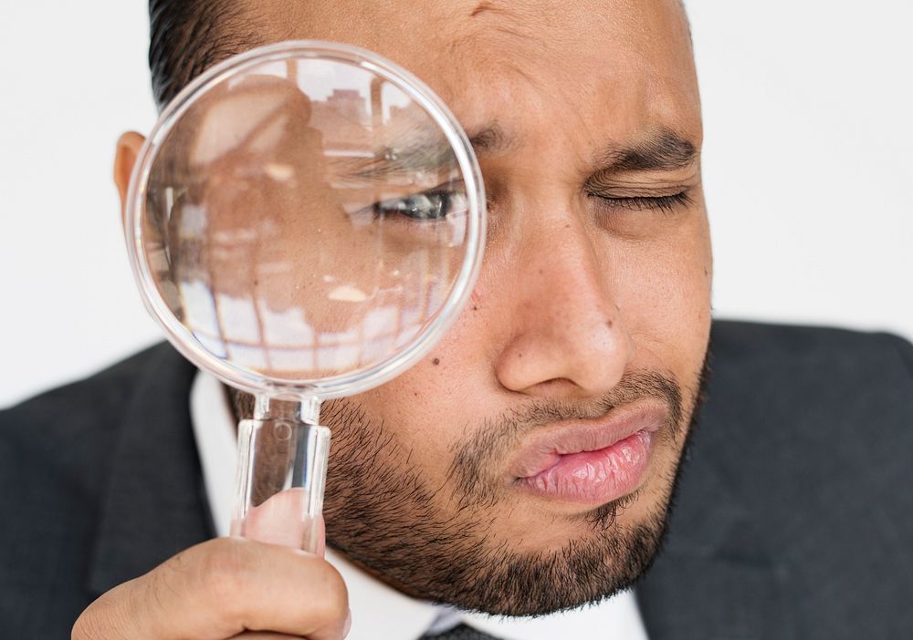 Indian Man Business Magnifying Glass Concept