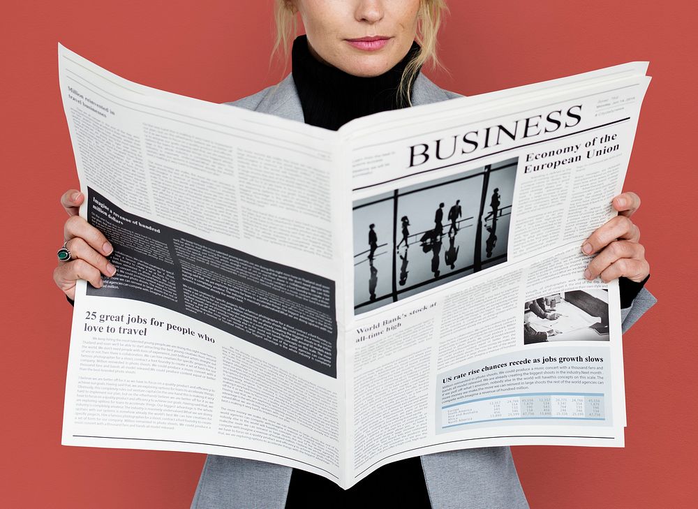 Business Woman Reading Newspaper Concept