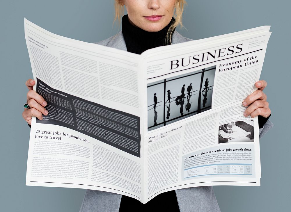 Business Woman Reading Newspaper Concept