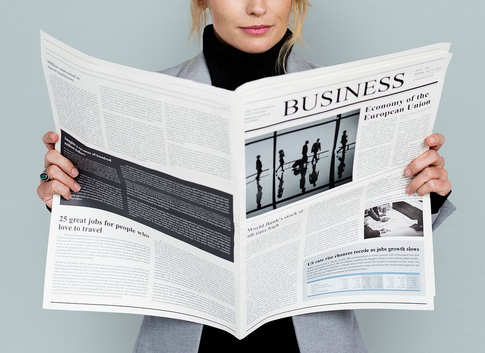 Business Woman Reading Newspaper Concept