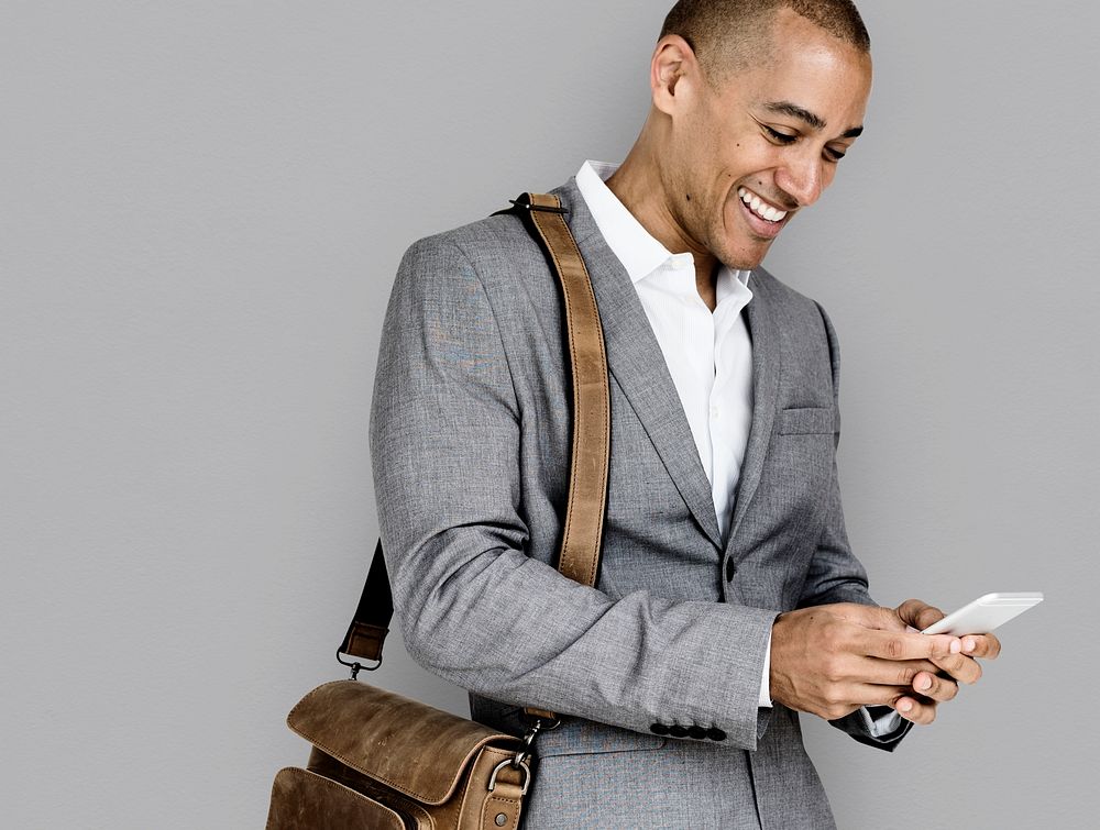 African Descent Business Man Smiling Phone