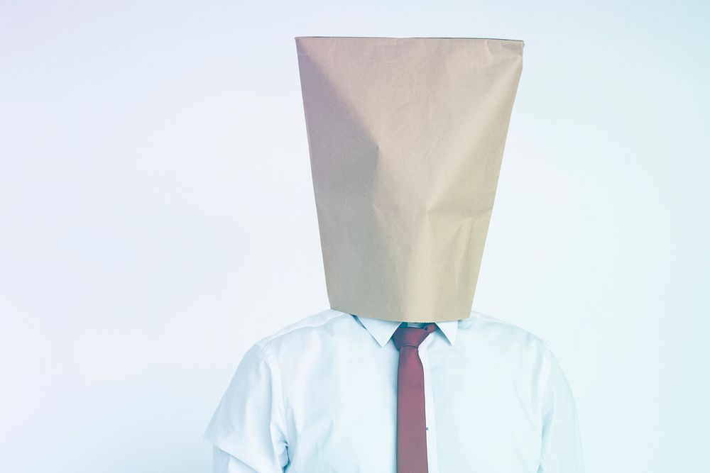 Face Coverd With Paper Bag Studio Portrait