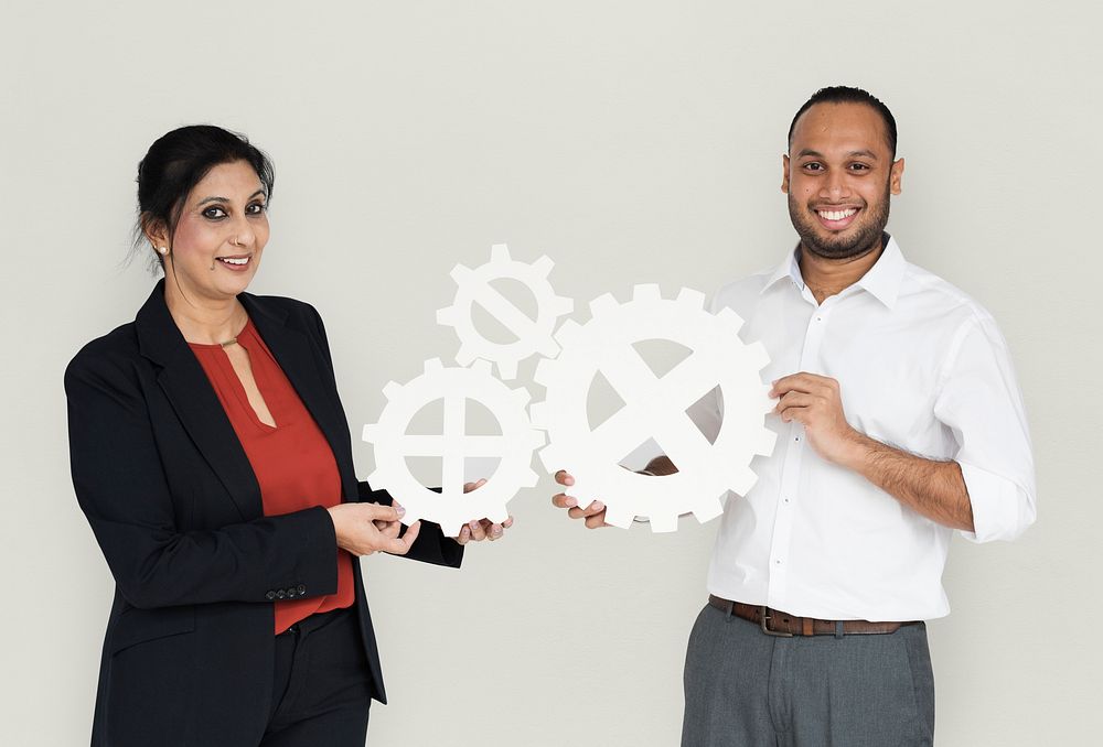 Business People Smiling Happiness Holding Gear Symbol Concept
