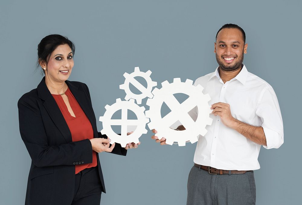 Business People Smiling Happiness Holding Gear Symbol Concept