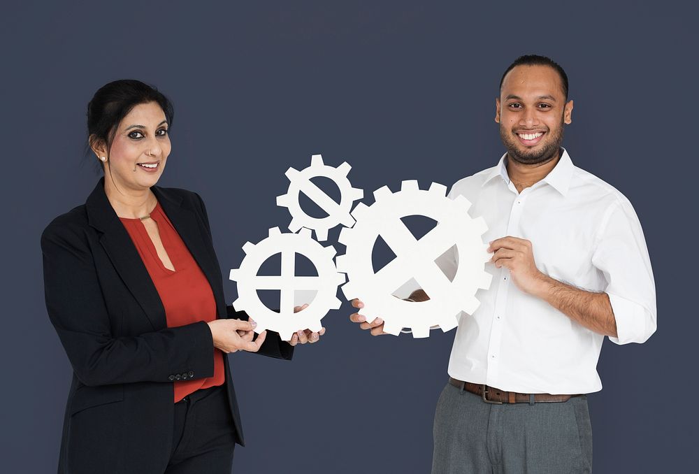 Business People Smiling Happiness Holding Gear Symbol Concept