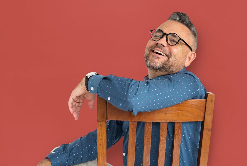 Casual Caucasian Man Sitting Smiling