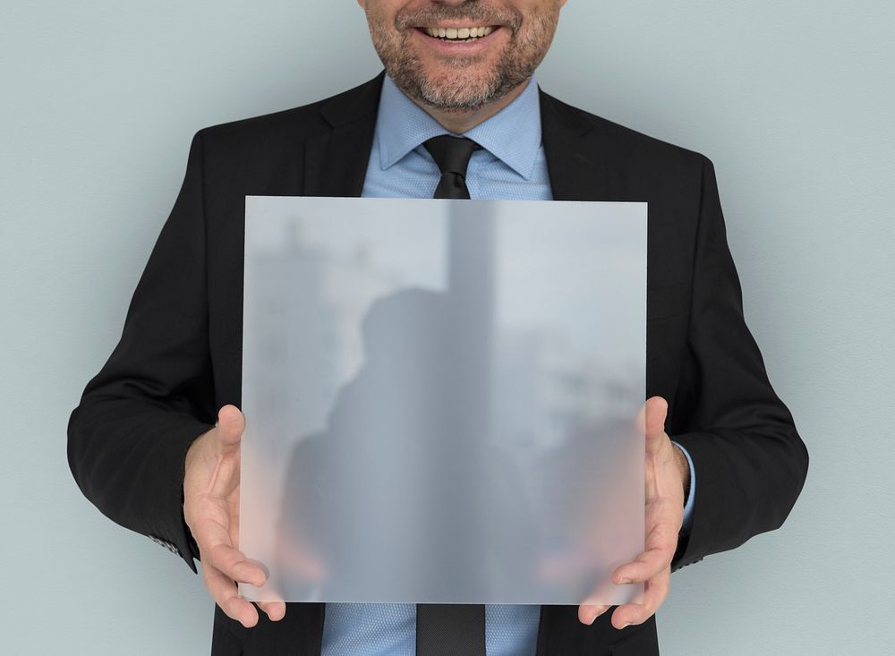 Business Man Holding Panel Smiling