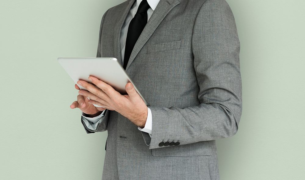 Business Man Using Tablet